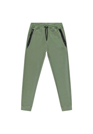 Groene joggingsbroek met een tailleband met koord, voorzien van zwarte zakken met rits aan beide zijden en taps toelopende boorden bij de enkels. Glad textuur van de stof.