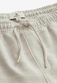 Next TEXTURED OTTOMAN REGULAR FIT - Tracksuit bottoms - grey