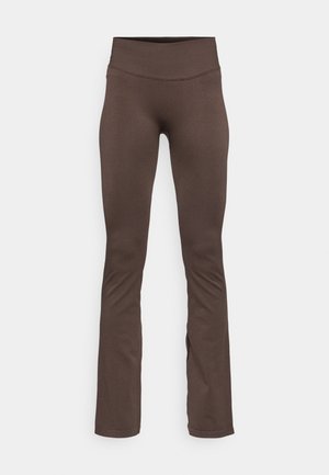 Leggings marroni a palazzo realizzati in tessuto elastico, con una vita alta e una superficie liscia, senza motivi o dettagli visibili.