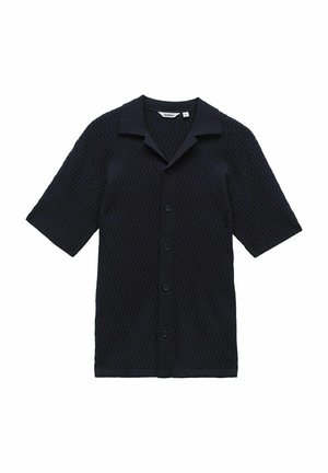 Marinblå kortärmad skjorta i strukturerad stickad tyg med krage, framknäppning och en avslappnad passform. Har ett subtilt mönster.