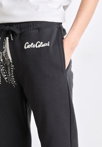 Carlo Colucci JOGGER UNISEX - Jogginghose - black