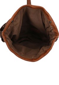Brown leather bag with a smooth finish, featuring a spacious tan fabric interior and a zip closure. The inside has a pocket for organization.