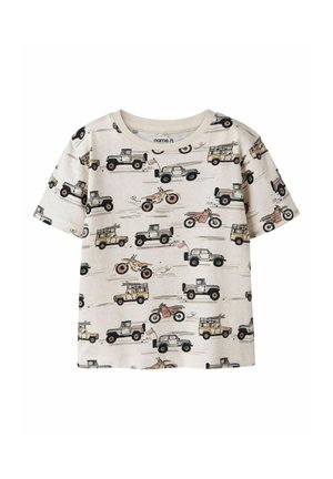 Beige children's t-shirt patterned with illustrations of off-road vehicles and motorcycles in black, brown, and tan tones.