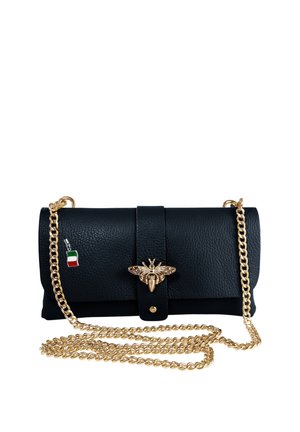 Black leather clutch with gold bee clasp, long gold chain strap, and small Italian flag charm on chain link.