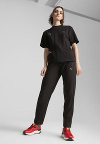 Puma SCUDERIA FERRARI STYLE - Träningsbyxor - black