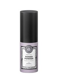 Lila zylindrischer Behälter mit einer mattschwarzen Kappe. Das Vorderetikett zeigt fettgedruckten Text und dekorative schwarze Linienmuster. Volumen 2g.