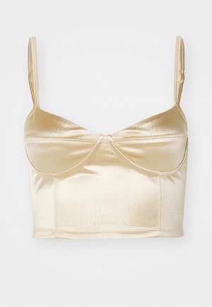 Top cropped de cetim em dourado claro com alças finas, apresentando uma faixa larga, copas estruturadas e um design sem costuras para uma aparência suave.