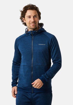 Navyblaue Zip-Hoodie aus strukturiertem Stoff mit hohem Kragen, verstellbarem Kapuzen und Fronttaschen. Logo auf der Brust.