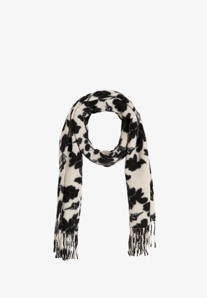 Écharpe à motif floral crème et noir, en tissu doux avec extrémités à franges. Présente de grandes fleurs noires sur un fond clair.