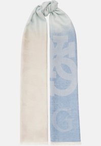 Tweedekleurige sjaal in lichtcrème en zacht blauw, met subtiele strepen en een groot logo-patroon, afgewerkt met franjes en een zachte textuur.