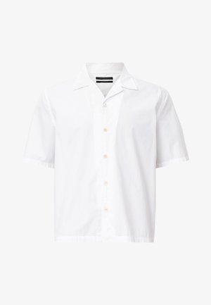 Biała koszula z krótkim rękawem uszyta z bawełny, z kołnierzykiem rozłożystym, sześcioma guzikami z przodu oraz luźnym krojem.