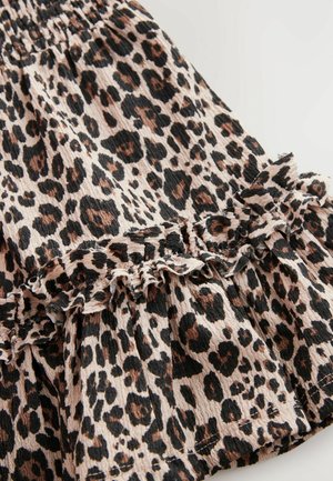 Løveprint nederdel med flæset kant, struktureret stof og elastisk talje i nuancer af beige, sort og brun.
