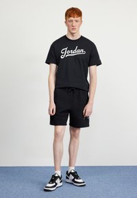 Jordan Träningsshorts - black/white