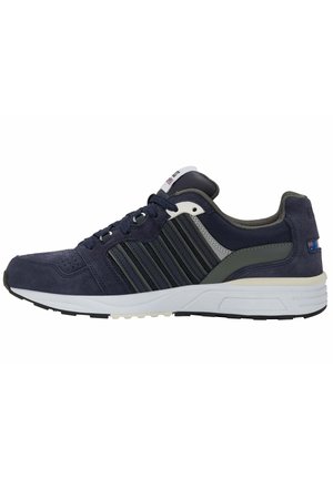 Navy suede and mesh sneaker with dark gray accents, white sole, and contrasting lacing. Features three black stripes on the side.