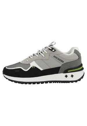 Gray and black sneaker with a textured upper, white sole, green accents, and black traction outsole; features laces and brand logo.