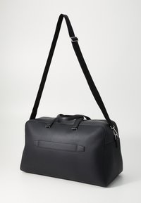 Tommy Hilfiger DUFFLE UNISEX - Weekendveske - black