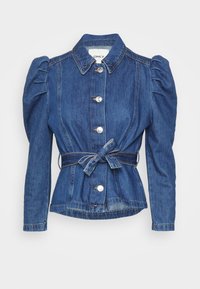 Jeansová bunda s nabíranými rukávy, přiléhavým střihem a uvázaným opaskem v pase. Má světlý odstín a stříbrné knoflíkové zapínání.