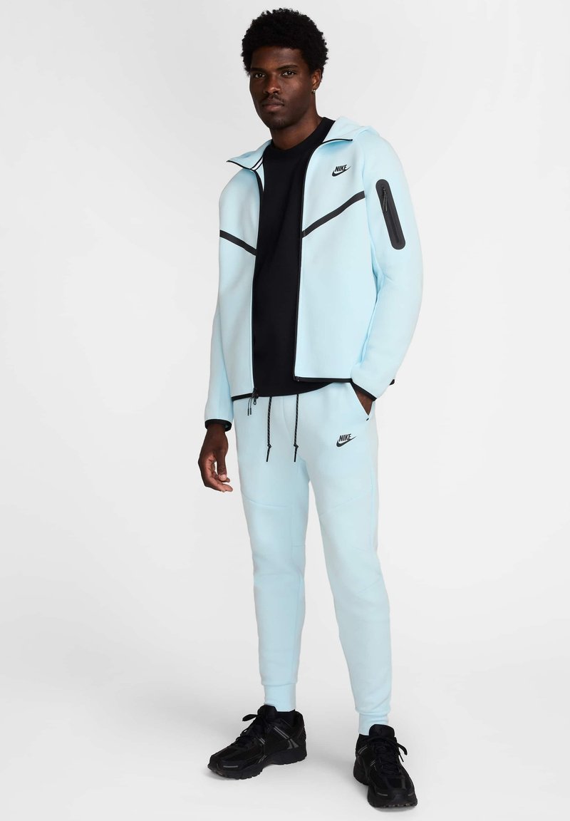 Nike Sportswear Pantalones deportivos glacier blue black/azul