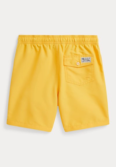 Calções de banho amarelos com cintura elástica, um único bolso traseiro e um rótulo tecido no bolso. Tecido suave e leve.