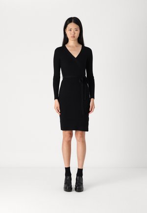 Black ribbed knit wrap dress with long sleeves and a self-tie belt at the waist, featuring a V-neckline and a fitted silhouette.