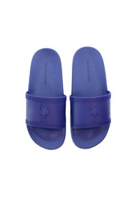 Purple rubber slides featuring a textured band with embossed logo and patterned accents. Smooth footbed and open-toe design.