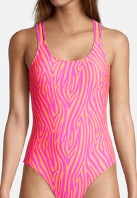 One-piece swimsuit in bright pink with a bold orange zebra stripe pattern. Features thin straps and a scoop neckline. Smooth texture.