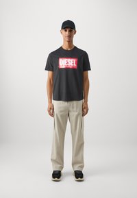 Diesel ADJUST - T-shirt con stampa - black