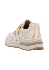 Beige Sneaker mit glatter Textur, ausgestattet mit einem Reißverschluss, weißer Sohle und lila sowie grünen Nähten.