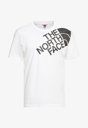 T-shirt bianco in cotone con maniche corte, caratterizzato da una grande stampa nera del logo sulla parte anteriore, con un elemento di design curvo nero nell'angolo superiore.