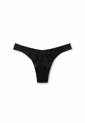 Zwarte kanten string met ingewikkelde bloemenpatronen, een zacht mesh lichaam, golvende randen en een smalle elastische tailleband.