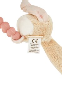 Soft plush bunny toy with pale brown fur, a pink patterned fabric ear, and a pink bead attachment. Tag shows manufacturer details.