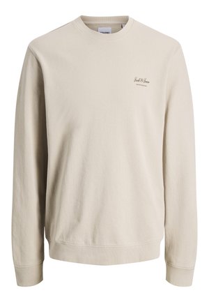 Beige long-sleeve crew neck sweatshirt with small "Jack & Jones" logo on the left chest, ribbed cuffs, and hem.