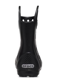 Botte chelsea en caoutchouc noir avec un dos haut, un design perforé et une semelle texturée. Présente une étiquette logo argentée sur le talon.