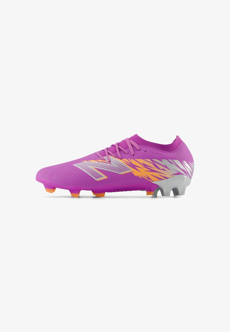 Pink soccer cleat with a textured upper, silver and orange accents, and a lightweight design. Features sharp, studded traction on the sole.