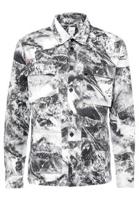 Camicia a maniche lunghe con stampa astratta di montagne in bianco e nero e due tasche sul petto.