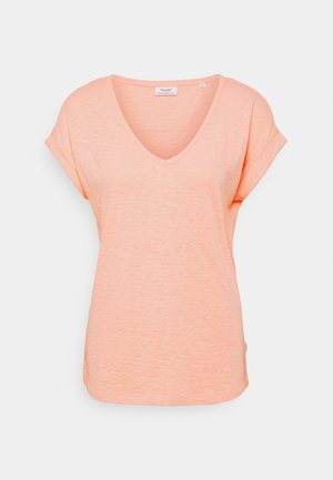 Blød, ferskenfarvet T-shirt til kvinder med korte ærmer, V-hals, optrukne manchetter og ensfarvet design.