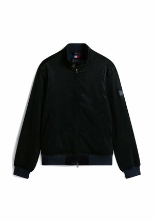 Navy blue bomber jacket with a high collar, zip front, side pockets, ribbed cuffs, and a small logo patch on the left shoulder.