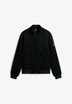 Navy blue bomber jacket with a high collar, zip front, side pockets, ribbed cuffs, and a small logo patch on the left shoulder.
