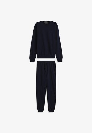 Ensemble sweat-shirt et pantalon de survêtement bleu marine en mélange de coton doux. Le sweat-shirt possède un col en V et des poignets côtelés ; le pantalon de survêtement est doté d'une taille élastique et de jambes fuselées.