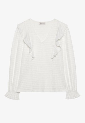 Blusa blanca de manga larga con escote en V, con acentos de volantes en los hombros y puños, fabricada en tejido texturizado.