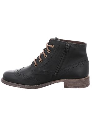 Black leather ankle boot with brogue detailing, brown laces, side zipper, and a low wooden heel. Features smooth texture and rounded toe.