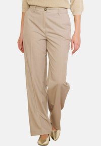 Bēša krāsas plata piegriezuma bikses ar smalku svītrainu rakstu, priekšpusē pogu aizdari un divām sānu kabatām. Viegls audums ar gludu tekstūru.