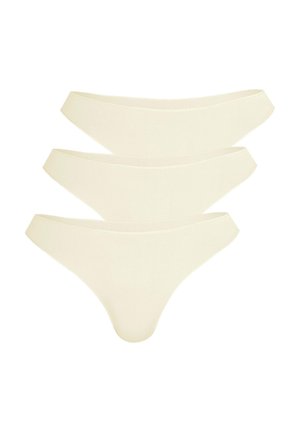 Drei Paare von cremefarbenen Tangaunterhosen mit einem glatten elastischen Bund und nahtlosem Design für eine bequeme Passform.