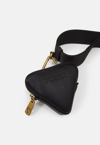 Guess VEZZOLA - Taška s příčným popruhem - dark brown/ochre