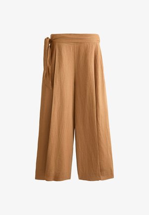 Brown, wide-legged trousers made from textured fabric, featuring a tied waistband and pleated front for added structure.