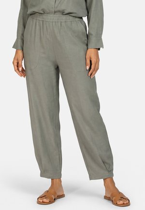 - Spodnie materiałowe