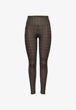 Leggings de cintura alta en tejido elástico, con una base negra y un patrón geométrico en beige, textura suave y corte a la altura del tobillo.