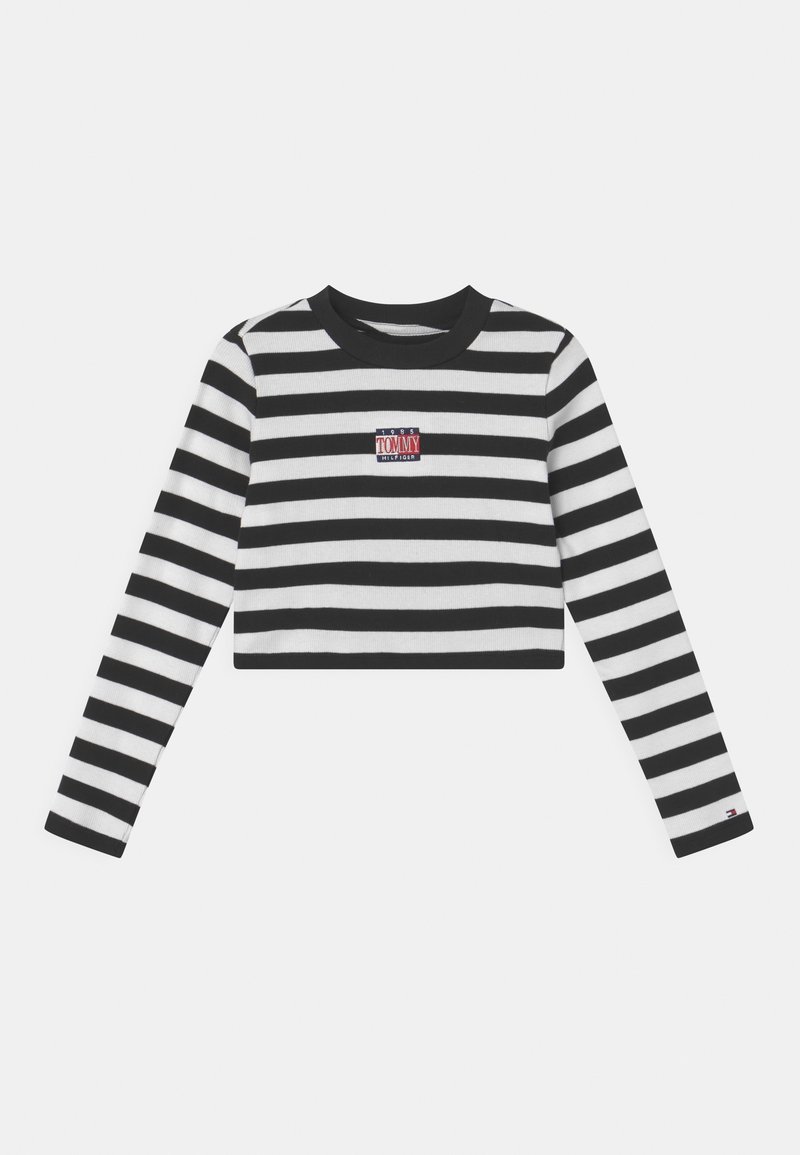 Mustapaitainen lyhythihainen crop-top, jossa on pitkähihaiset hihat, pyöreä kaula-aukko ja pieni brodeerattu logo rinnassa. Samanlaiseen tyyliin ribbihihansuut.