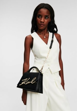 K/SIGNATURE 2.0 CROSSBODY - Handbag - black gold