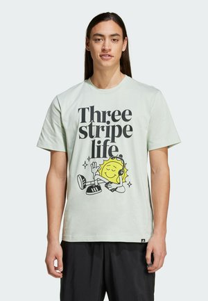 adidas Sportswear POSITIVITY GRAPHIC - Print T-shirt - linen green
